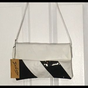 De Luigi White and Black Patent Leather Clutch